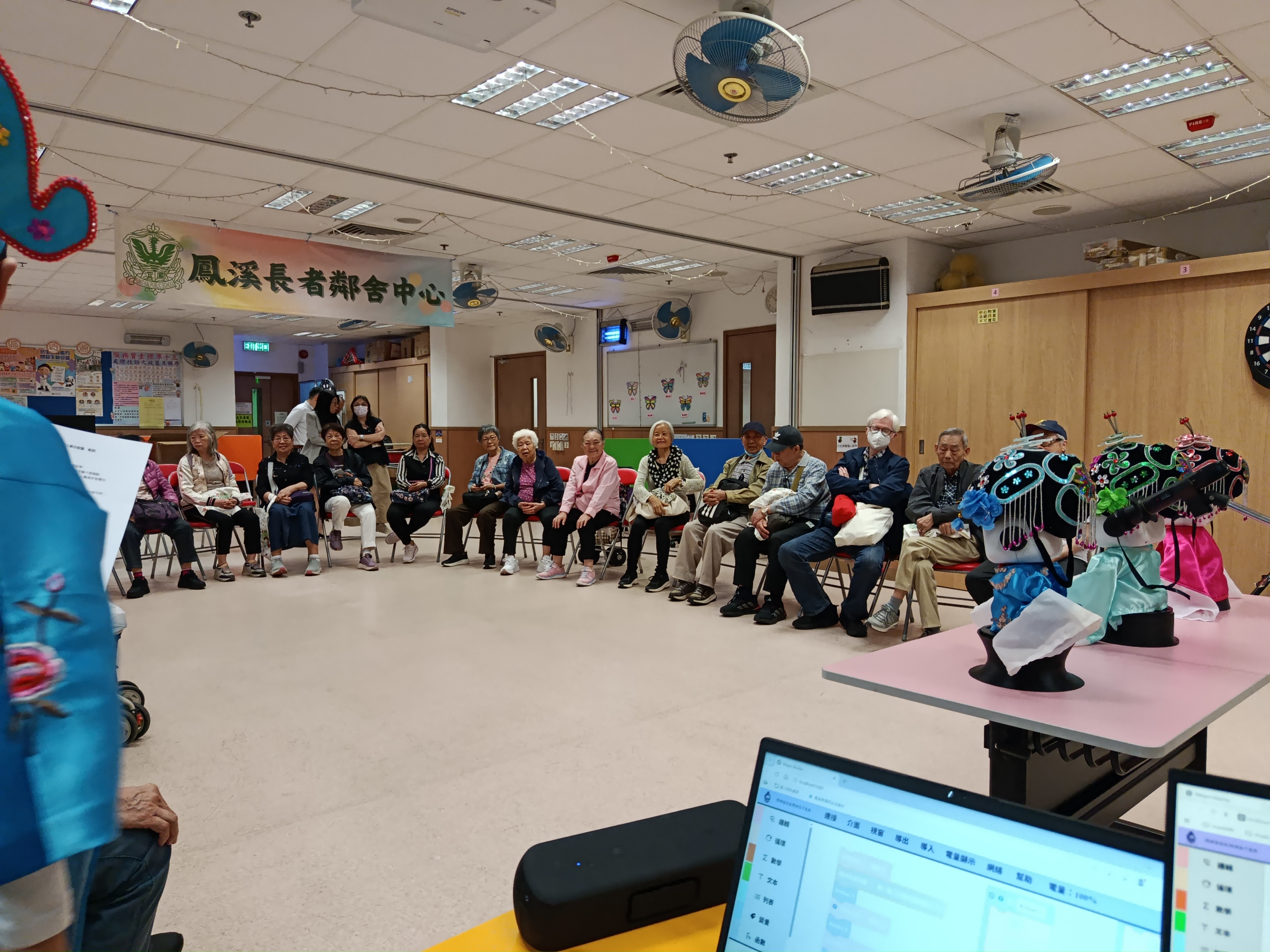 Community participants attending a robot activity
