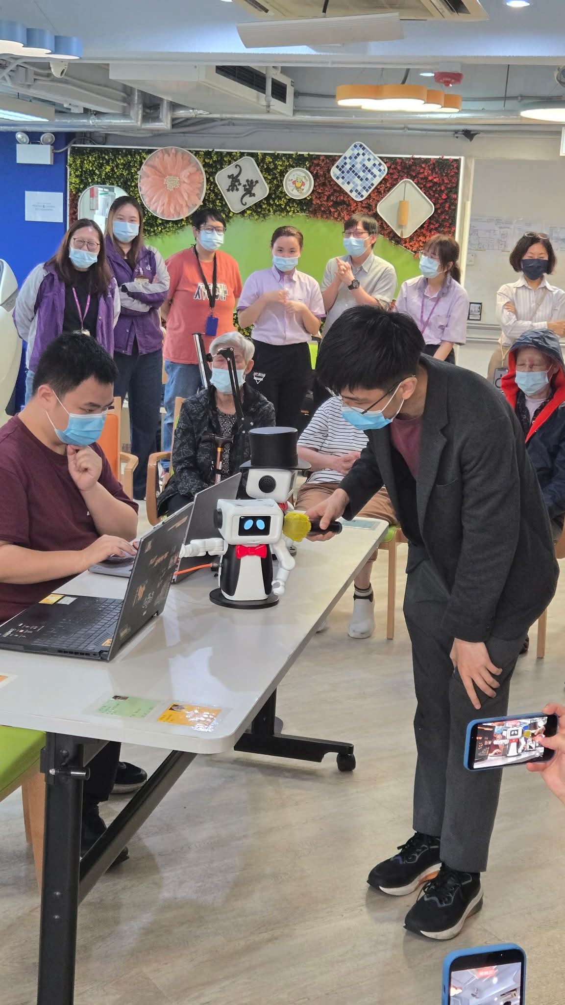 A student interacting with Magos